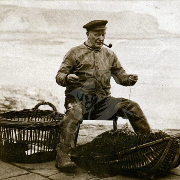 Fisherman mending nets